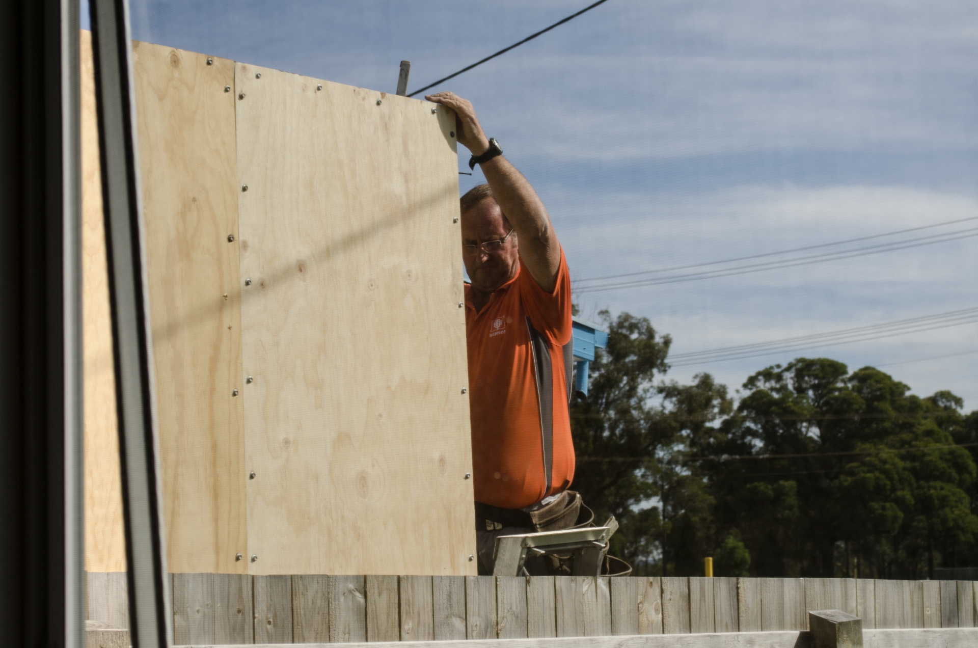 Rawson Homes illegal fence now extends to 9 feet..jpg